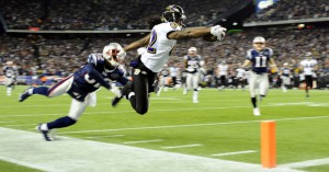 Baltimore Ravens wide receiver Torrey Smith (R) reaches out for a touchdown as he is tackled by New England Patriots cornerback Devin McCourty (L) in the third quarter of the AFC Championship game at Gillette Stadium in Foxborough, Massachusetts, USA, 22 January 2012.  The winner will go on to face either the San Francisco 49ers or the New York Giants in Super Bowl XLVI 05 February in Indianapolis, Indiana.
