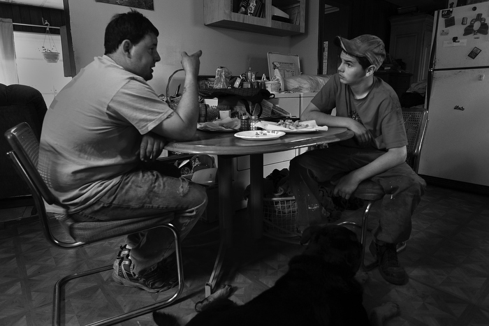 Sitting in his parent's kitchen, Pete Gilcris and son Nick strategize over a french fry lunch. They are under the gun to finish Nick's Camaro for opening day at Riverside Speedway in two days. Pete broke his neck racing in 2010, and son Nick rolled his car over 6 times during his first year of racing when he was 12.