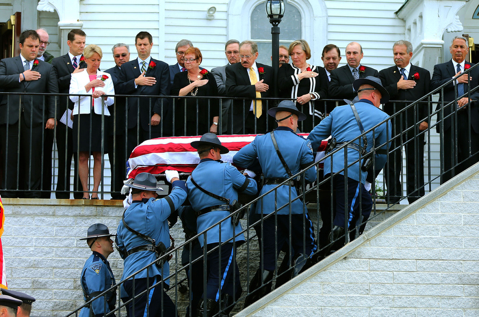 Hudson-06/14/13- A funeral mass was held at Saint Michael Church for former Gov. Paul Cellucci , where friends, family and politicians attended. Pallbearers carry the casket into the church.