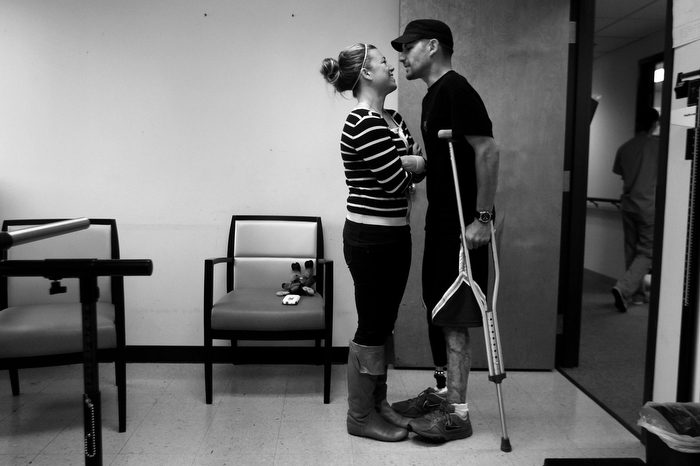 Marc and Jen at his fitting for his new prosthetic leg at the Hanger Clinic in Woburn. After the bombing Jen thought her plans for their life were gone. Yet, here they are six months out, hanging on and making it work.