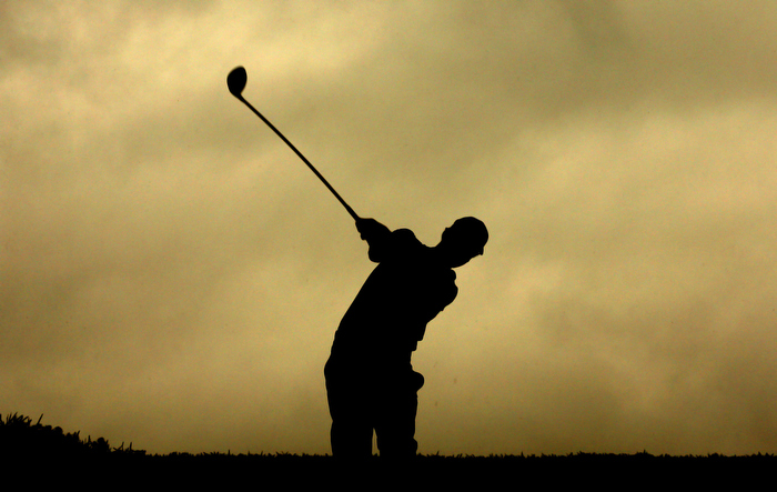 Aug 9, 2013; Rochester, NY, USA; Adam Scott tees off on the 16th hole during the second round of the 95th PGA Championship at Oak Hill Country Club.