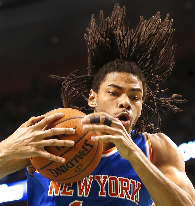 New York Knicks' Chris Copeland grabs a rebound during the fourth quarter of New York's 100-85 win over the Boston Celtics in a NBA basketball game in Boston Tuesday, March 26, 2013.