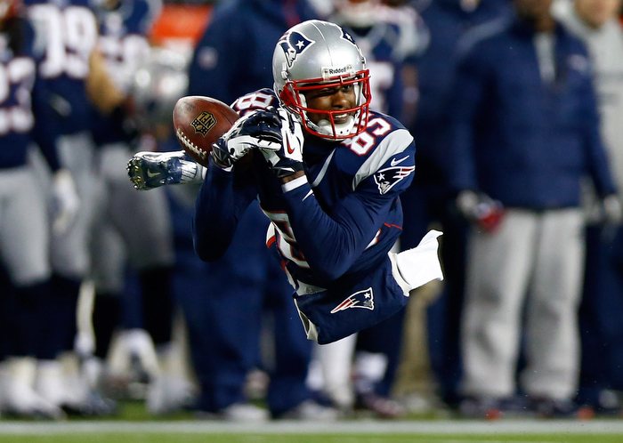 Brandon Lloyd #85 of the New England Patriots misses a catch against the Baltimore Ravens during the 2013 AFC Championship game at Gillette Stadium on January 20, 2013 in Foxboro, Massachusetts.