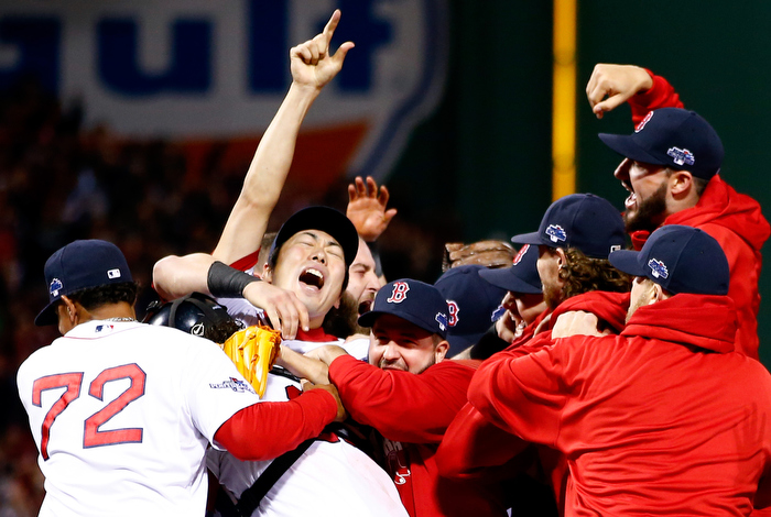 Koji Uehara #19 of the Boston Red Sox celebrates after defeating the Detroit Tigers in Game Six of the American League Championship Series at Fenway Park on October 19, 2013 in Boston, Massachusetts. The Red Sox defeated the Tigers 5-2 to clinch the ALCS in six games.