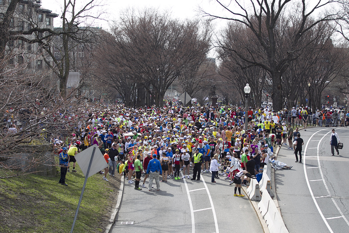 Boston, MA - 4/15/2013 - Runners of the Boston Marathon who had not finished the race were stopped before the Mass. Ave. overpass on Commonwealth Ave. after the bombings