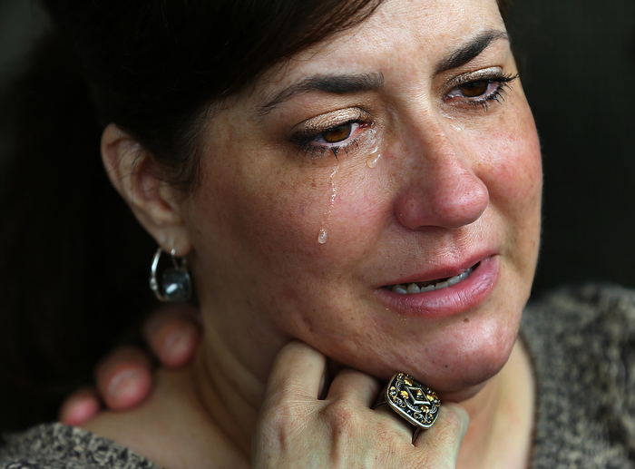Boston-5/22/13- Celeste Corcoran cries after being overwhelmed after getting fitted for her prosthetics at Spaulding Hospital. Her doctor told her the next time he will see her, she will be walking.