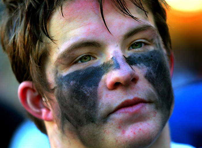 Foxborough12/07/13- Cohasset's Terence Doonan looks on dejectedly during the trophy ceremony as they lost to Litltleton in the high school Super Bowl football game at Gillette Stadium.