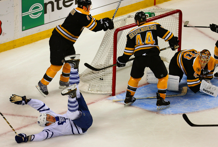 Boston-5/04/13-- Toronto's James van Riemsdyk celebrates on his back after his 3rd period goal putting Toronto up 4-2. Bruins Wade Redden, Dennis Seidenberg and Tuukka Rask look on.
