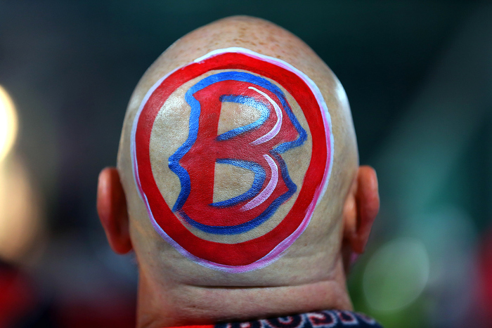 Boston-10/30/13--World Series game 6- Don Smead from Putney VT. wears a "B" on his bald head as he attends his 1289th Red Sox game.