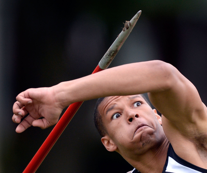Newton North's Nick Fofana throws the javelin during the Division 1 state relays at Andover High School on Monday, May 19, 2014.