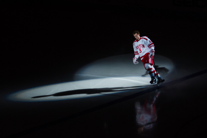 March 13, 2015 – Boston University’s Jack Eichel skates as he is introduced in a pre-game ceremony of a Men’s Hockey East playoffs quarterfinal game against Merrimack College at Agganis Arena in Boston, Mass.