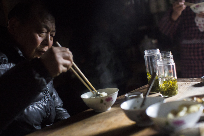 Su, a tea farmer, was born and raised in Huangtian village. He was a physical education teacher at the village school before it was relocated to the town, January 6, 2015.