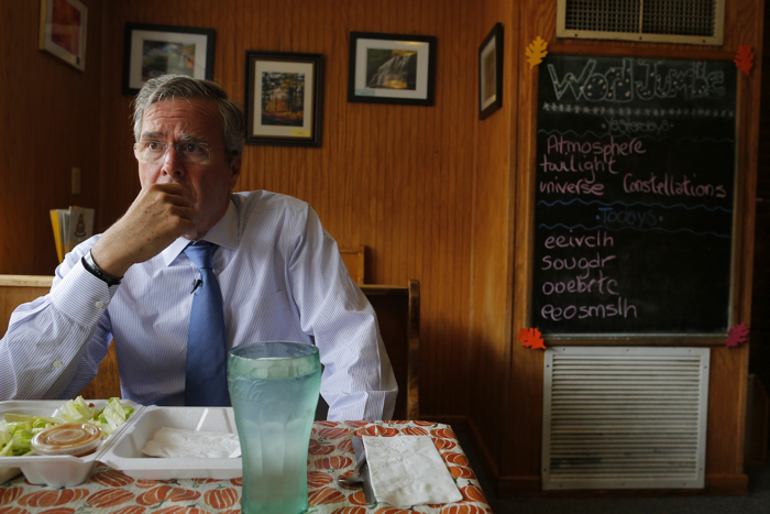 U.S. Republican presidential candidate Jeb Bush listens to a question during an interview with Reuters at Nonie's Restaurant in Peterborough, New Hampshire October 13, 2015.