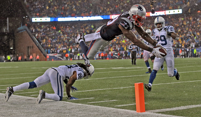 New England Patriots wide receiver Brandon LaFell dives for the end zone just short of a touchdown over Indianapolis Colts cornerback Greg Toler in the fourth quarter of the AFC Championship Game at Gillette Stadium on Sunday, January 18, 2015.