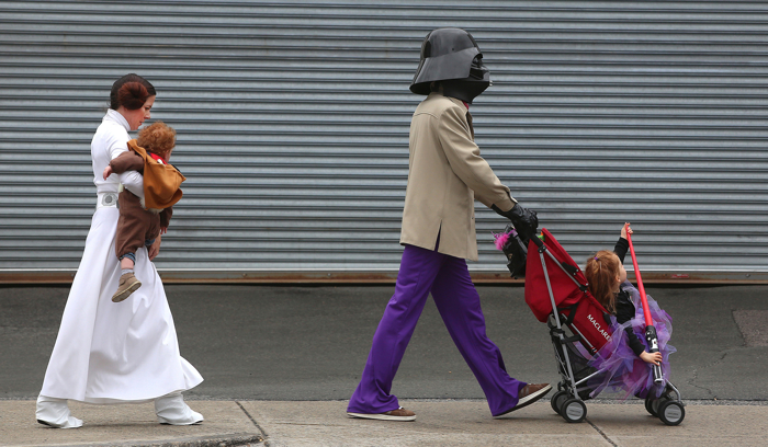 After attending "PRU BOO" for trick-or-treating at The Shops at Prudential Center," the Morra family heads down Harrison Avenue to another venue. Dad David is Darth Vader. Mom Ronda is Princess Leia.