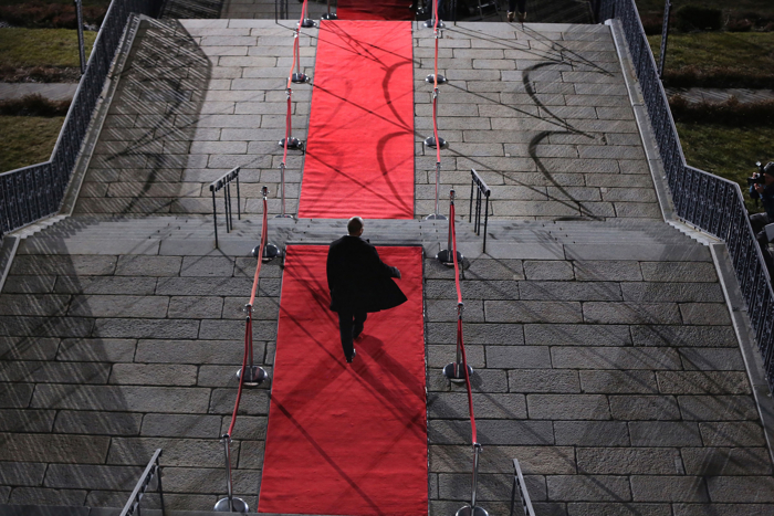 After moving through a crowd of supporters and well wishers inside, outgoing Governor Deval Patrick takes his Lone Walk out of the State House and back into private life.