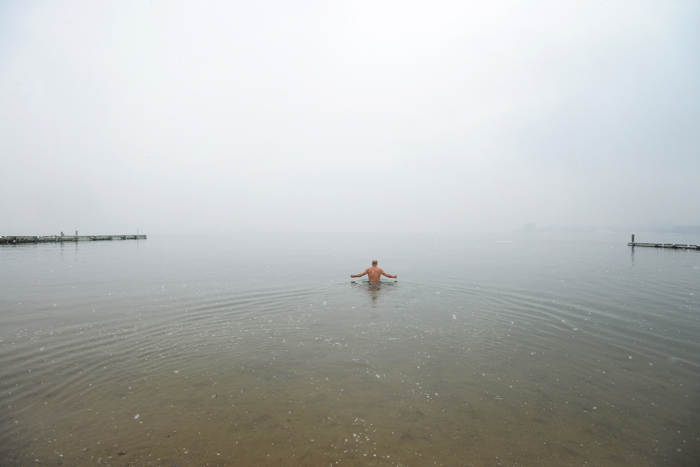 (Boston, MA 03/21 /15) Chris DeSisto takes a lone dip in the water after everyone has run out during the 2015 Harpoon Helps Cupid Splash on at the BCYF Curley Community Center in South Boston. Support your local beaches. March 21, 2015