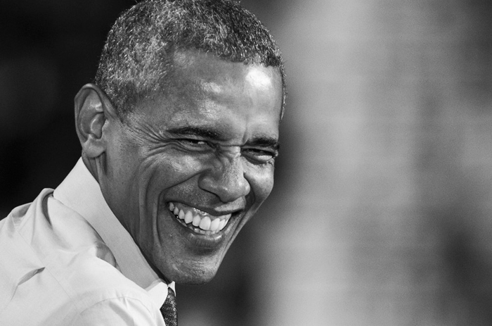 Nov. 7, 2016 – President Barack Obama laughs as he recounts moments from his election process at a rally in support of Democratic presidential candidate Hillary Clinton at the University of New Hampshire.