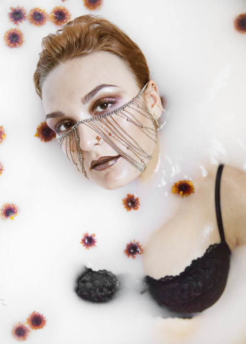 Nov. 13, 2016 – Samantha Morse, 21, of Boston, models in a bathtub composed of half milk, half water for a fall 2016 fashion spread.